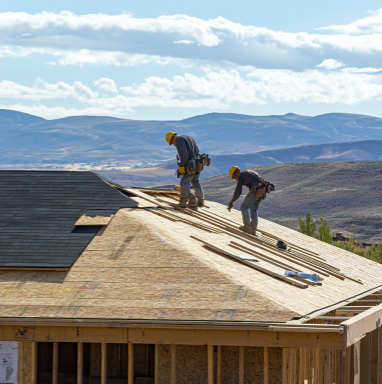 roofers working on the roof putting on shingles faq
